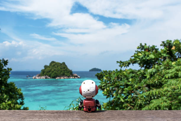 Toy Robot Sitting On The Sea View Terrace