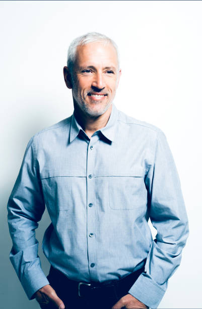 istock Businessman standing against white background 1127242250