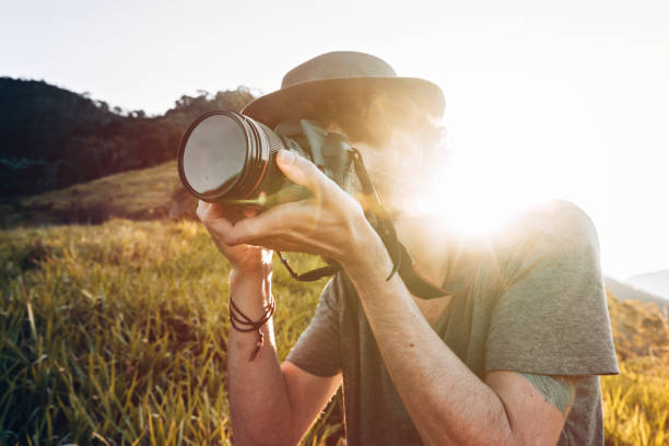 istock Young photographer outdoors 1127243360