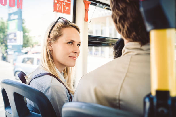 istock Girlfriend looking at boyfriend in bus 1127243643