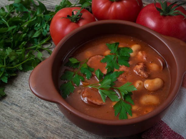 istock Bean soup in a brown bowl on a wooden table 1127247922