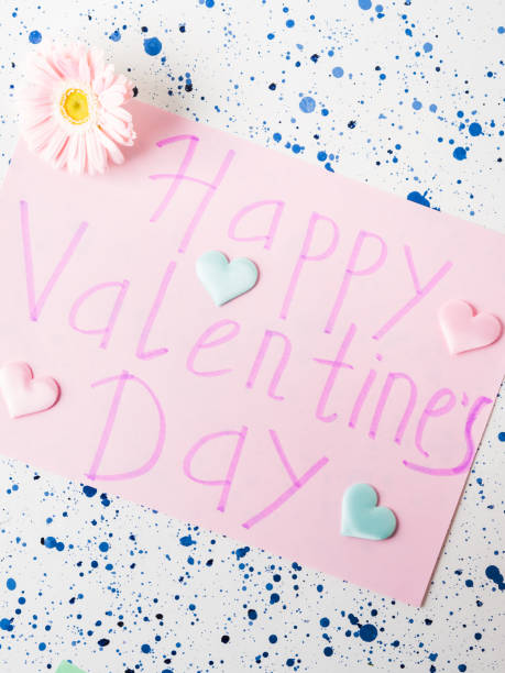 istock Happy Valentine's day pink card with flowers 1127247978
