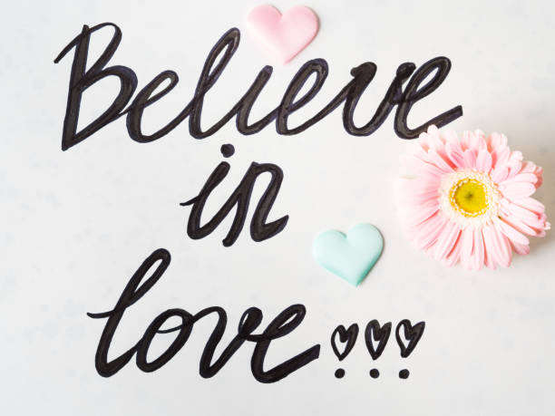 istock Believe in love written on white. Valentine's day 1127247982