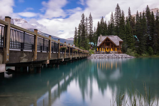 istock Looking down the bridge on Emerald lake towards the cabin 1127248241