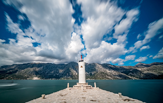 Lighthouse on the artificially built island of Our Lady on the Rock near Perast, Montenegro