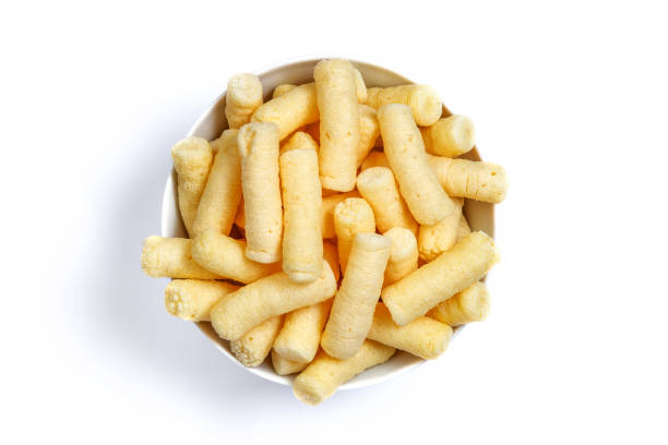 istock Crunchy corn puffs, pufuleti on bowl isolated over white 1127251274