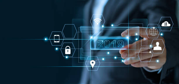 istock Businessman holding word number 2019 in hand with icon network connection on virtual screen, business strategy, banking and investment, digital marketing and payment, 2019 New year planning business and financial concept. 1127254378