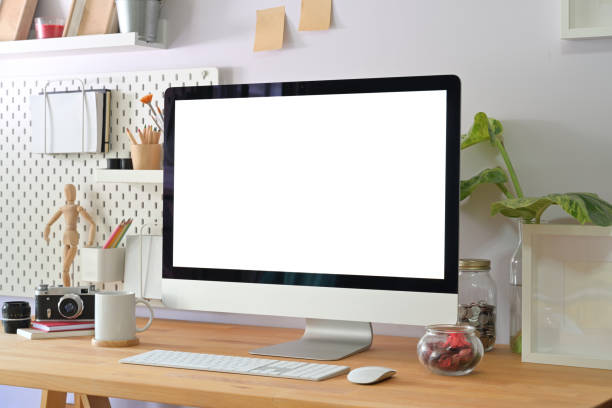 Home creative office interior with stylish photographer supplies and computer display