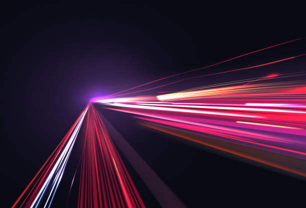 istock Vector image of colorful light trails with motion blur effect, long time exposure isolated on background 1127259823
