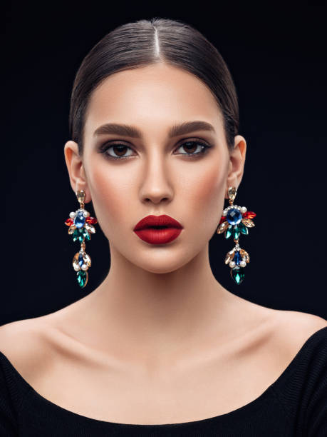 istock Beautiful woman with earring 1127260731