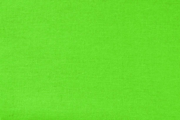 istock Green cotton fabric texture background, seamless pattern of natural textile. 1127261157