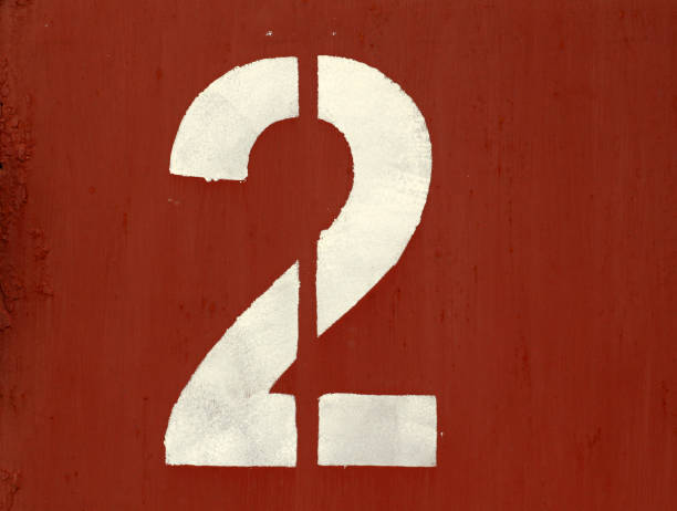 istock Red color number 1 in stencil on metal wall. 1127261365