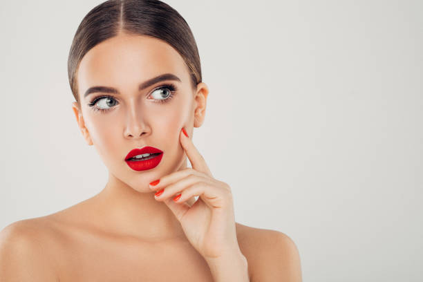 Studio shot of young beautiful woman