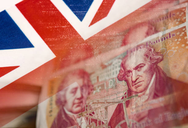 istock UK flag and fifty pound notes 1127264423