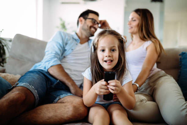 istock Happy family having fun time at home 1127265285
