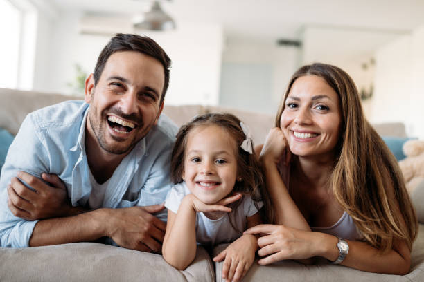 istock Happy family having fun time at home 1127265328