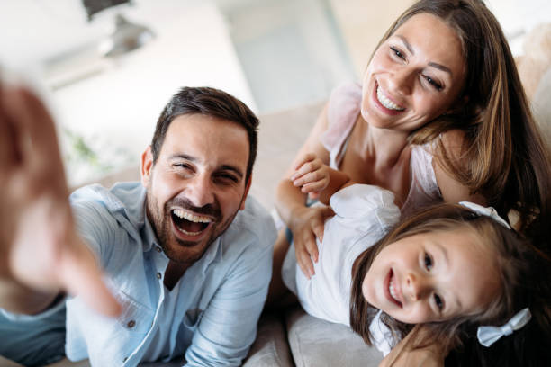 istock Happy family having fun time at home 1127265331