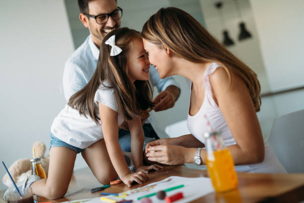 istock Happy family having fun time at home 1127265366