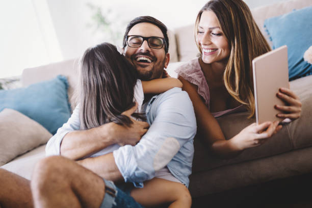 istock Happy family having fun time at home 1127265378