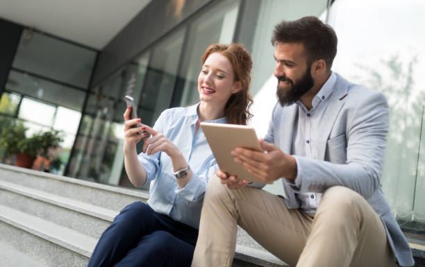 istock Business people discussing ideas outside. 1127266099