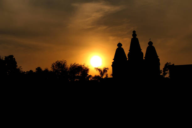 Temple dome silhouette with sunset, Tulapur, Maharashtra.