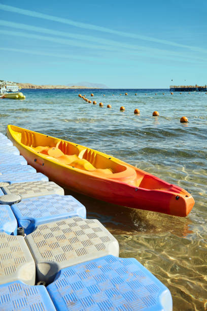 istock Kayak boat near the pier. 1127272644
