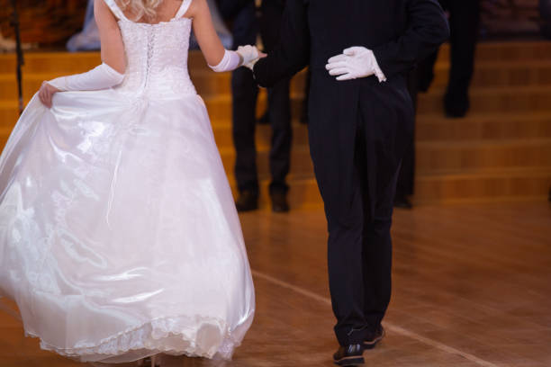 istock Newlyweds at the wedding. Photos from the back 1127274711