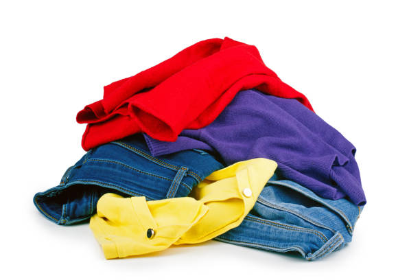 istock Pile of dirty cloth laundry isolated on white background 1127275361