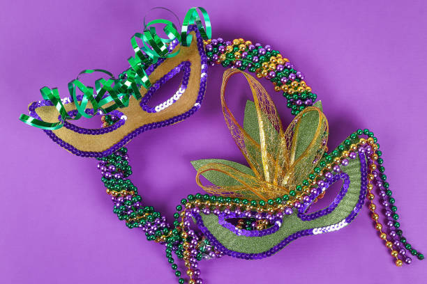 istock DIY wreath Mardi Gras, Fat Tuesday purple background. 1127275523