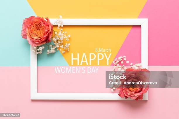 Happy Womens Day Pastel Colored Background Flat Lay Greeting Card With Beautiful Coral Hue Roses Stock Photo - Download Image Now