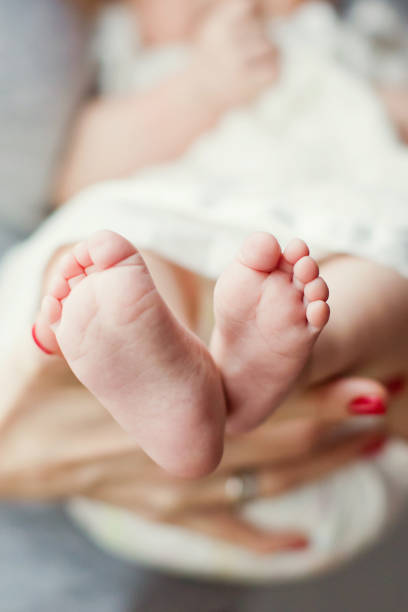 istock cute baby feet 1127277174