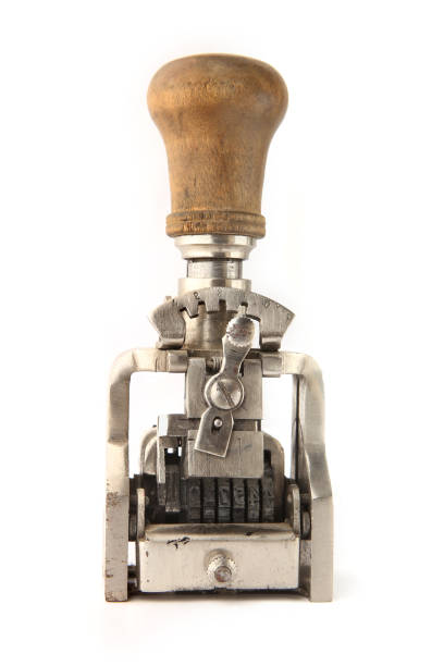 istock Vintage mechanical office date stamp isolated on white background. 1127278526