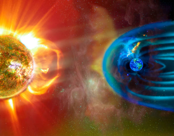 The Sun-Earth connection space weather. Blasts of perticles and magnetic field from the sun impact magnetosphere. Magnetic bubble around the Earth. Elements of this image furnished by NASA. stock photo