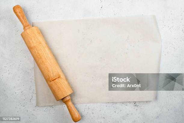 Rolling Pin And Baking Paper Background Stock Photo - Download Image Now - Rolled Up, Bakery, Rolling Pin