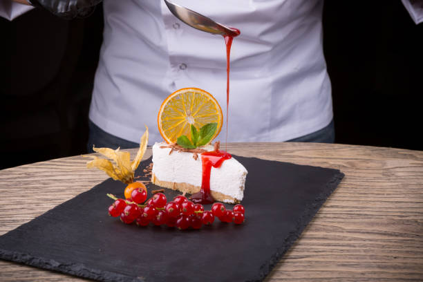 istock Slice of cheesecake served with red currant berries 1127284704
