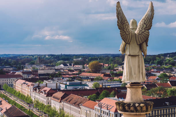 Potsdam City Skyline Panoramic View April, 18th, 2017 - Potsdam, Brandenburg, Germany. City skyline panoramic view from St. Nicholas' church dome with old town roofs and angel monument. Potsdam panorama from above. potsdam brandenburg stock pictures, royalty-free photos & images