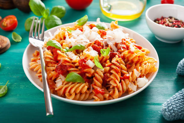 istock healthy fusilli pasta with tomato sauce parmesan basil 1127285606