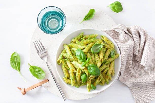 istock penne pasta with spinach basil pesto sauce 1127287184