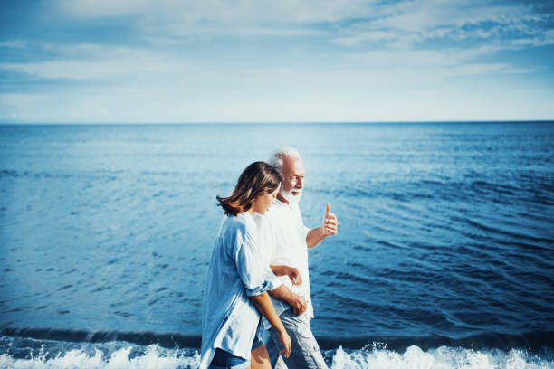 mi abuelo siempre decía que la vida es como un mar. - retirement grandfather senior adult child fotografías e imágenes de stock