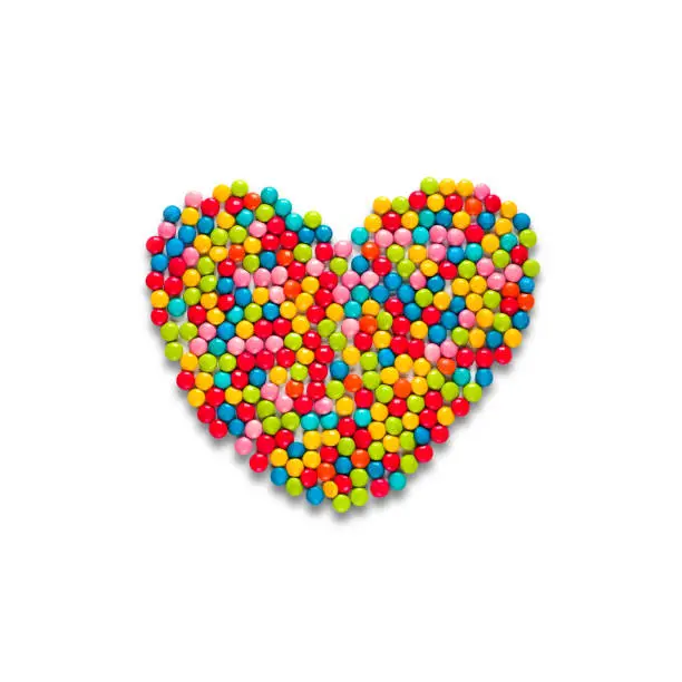 Photo of Multicolored candy heart isolated on white background