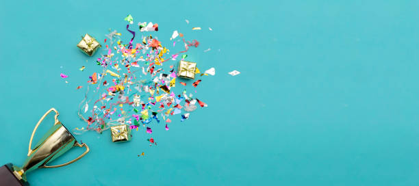 istock Celebrating the success that has happened, Gold trophy placed on a blue background. 1127290502