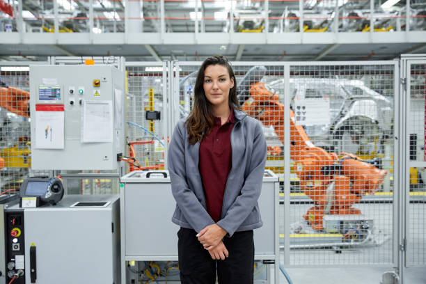 istock Confident female engineer in automobile industry 1127294292