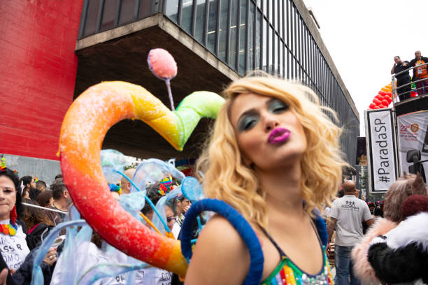 Gay Pride Parade 2018 - Sao Paulo Sao Paulo, Brazil - June 03: People attend the Gay Pride Parade on June 3, 2018 in Sao Paulo, Brazil.
People gathered in Sao Paulo for the 22nd annual Gay Pride parade, which is considered one of the biggest ones in the world. At the parade, the participants demonstrated for the rights of homosexuals. sao paulo gay pride parade stock pictures, royalty-free photos & images