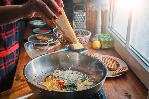 istock Preparing Spinach Egg Omelet with Chili and Parmesan 1127295732
