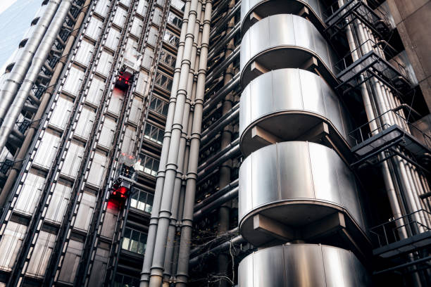 the Lloyds Building in London A photograph of the Lloyds Building in London from ground lloyds of london photos stock pictures, royalty-free photos & images