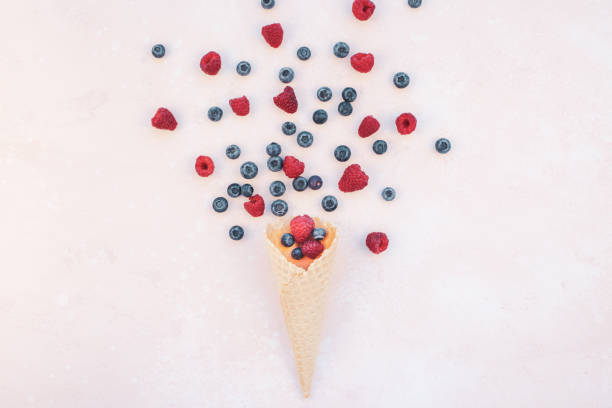 Summer composition berries ice cream waffle cone