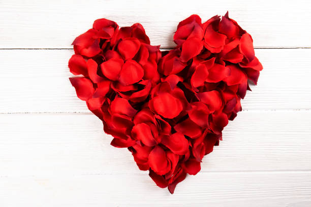 istock Beautiful bright red rose petals, romantic gesture, background. Happy valentines day oliday sales concept. 1127298143
