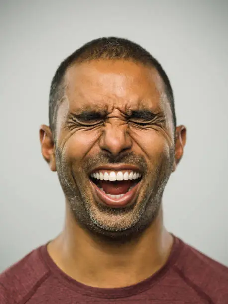 Photo of Real pakistani man with excited expression and eyes closed
