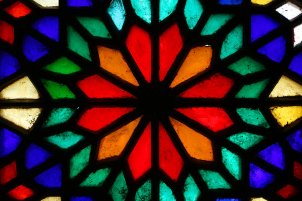 istock Beautiful colorful stained glass window patterns in Yazd, Iran 1127304295