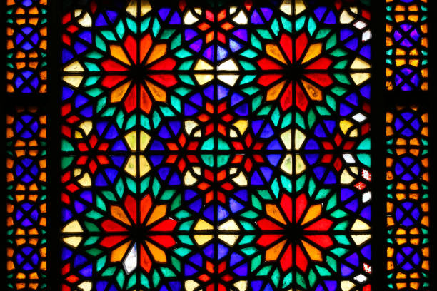 istock Beautiful colorful stained glass window patterns in Yazd, Iran 1127304299
